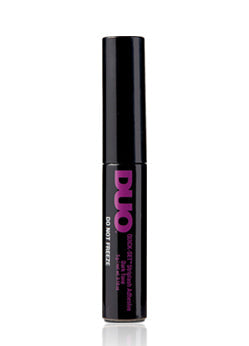 DUO Quick-Set StripLash Adhesive in dark tone with sleek black bottle and long-lasting, secure hold formula.