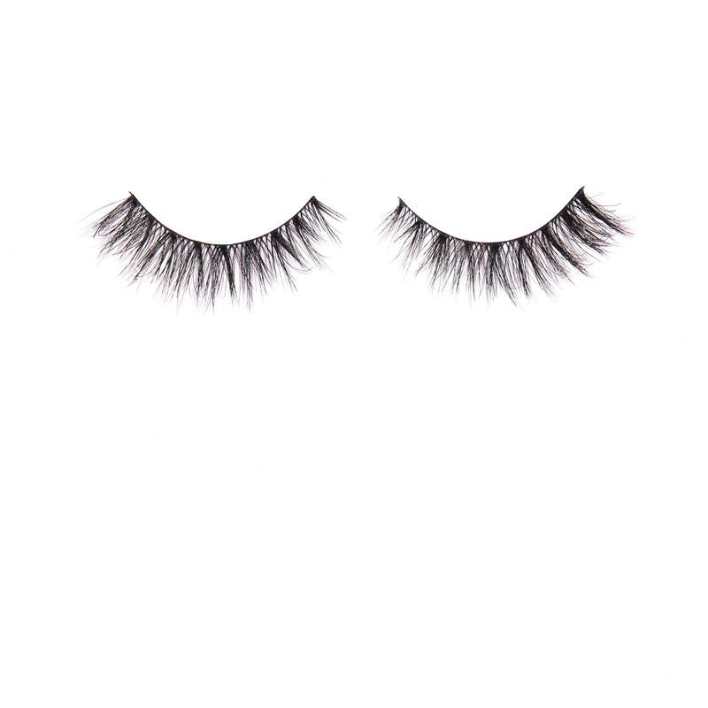 Pair of false eyelashes on a white background