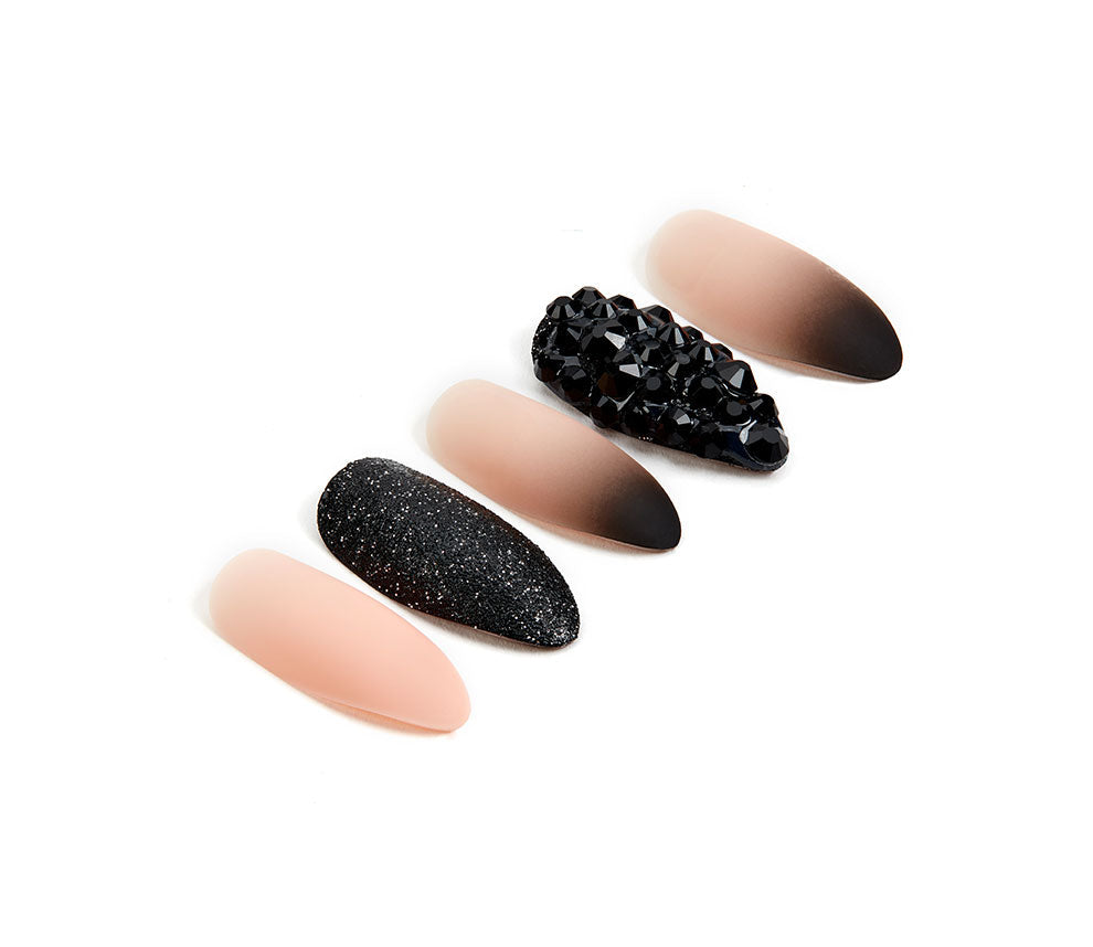 Ardell Nail Addict Artificial Nail set in black and pink ombre, studded with an almond shape