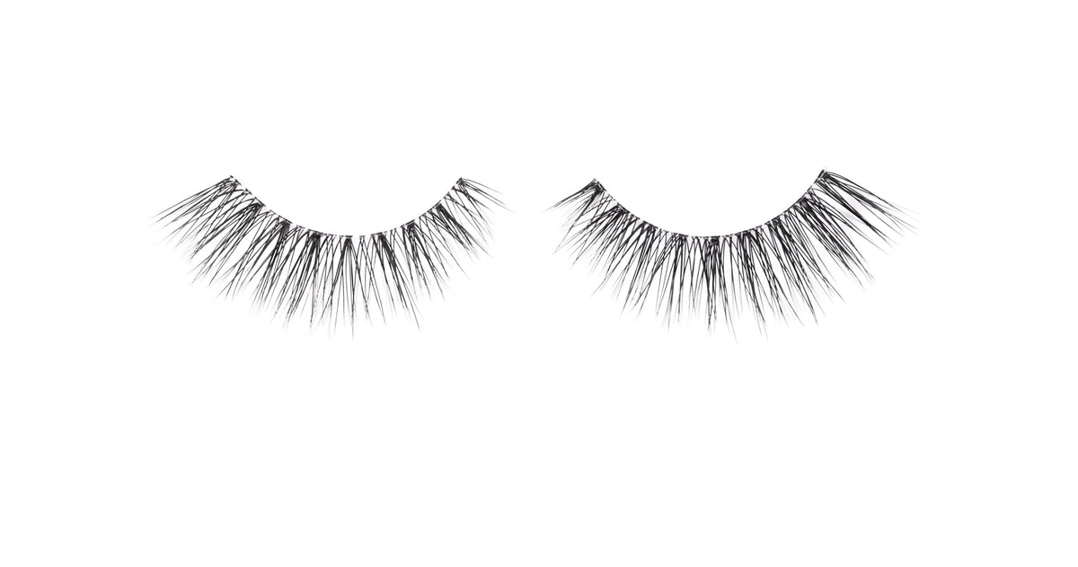 Pair of false eyelashes on a white background