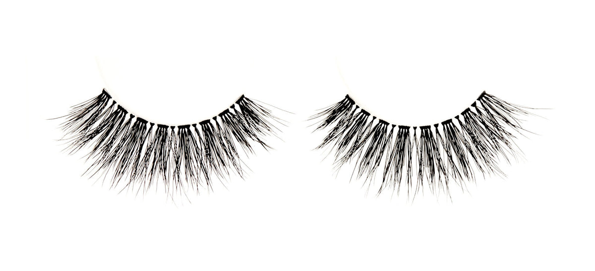 Pair of Ardell Wispies 705 featuring a round and multidimensional look on a white background