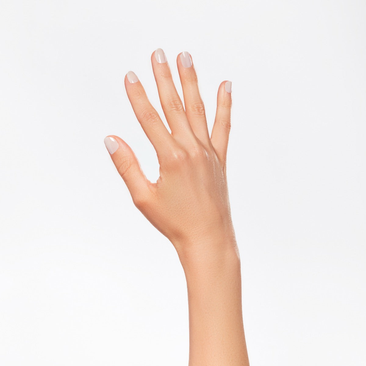 A lady's hand with beautiful nail color.