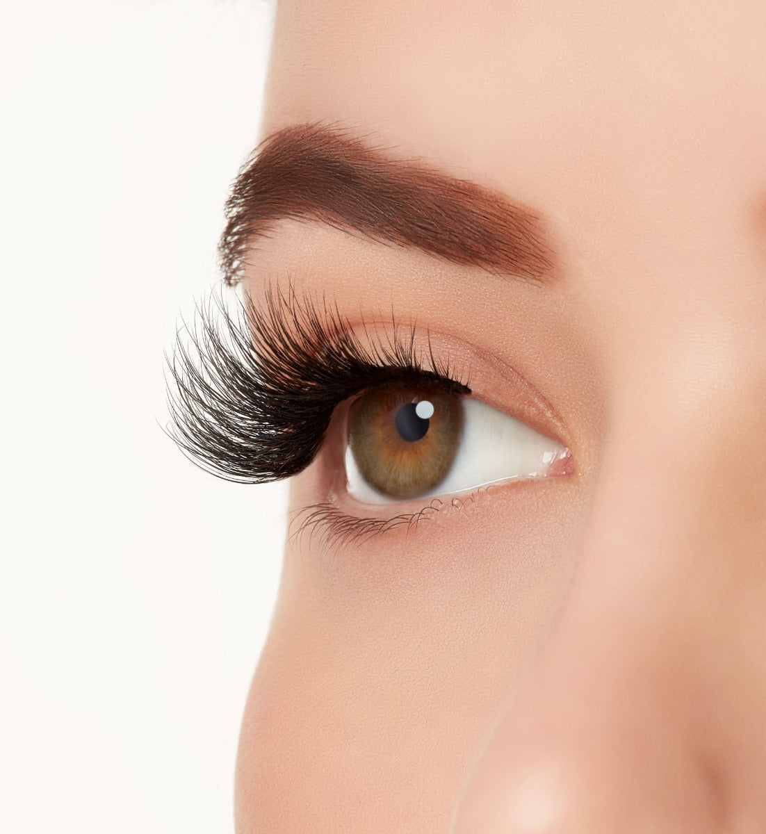 Side view close-up of a model's open right eye wearing Ardell Mega Volume 260 faux eye lashes
