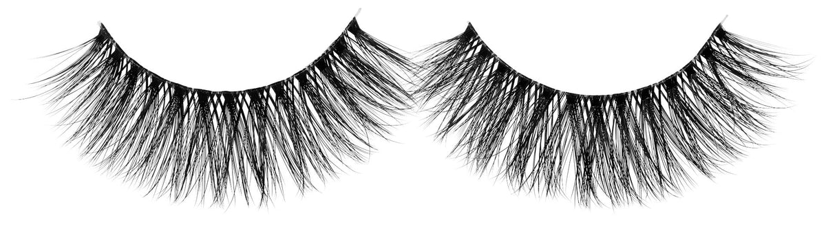 A single pair of Ardell Faux Mink 853 featuring its rounded shaping and extra long lengths