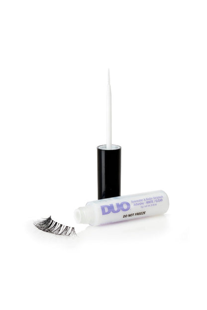 DUO Rosewater & Biotin StripLash Adhesive white/clear with precision brush, shown with a false lash for easy application.
